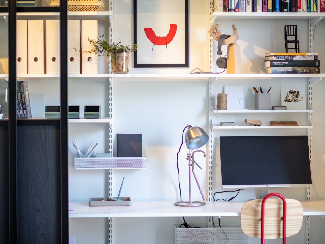 Home office with sliding doors in front