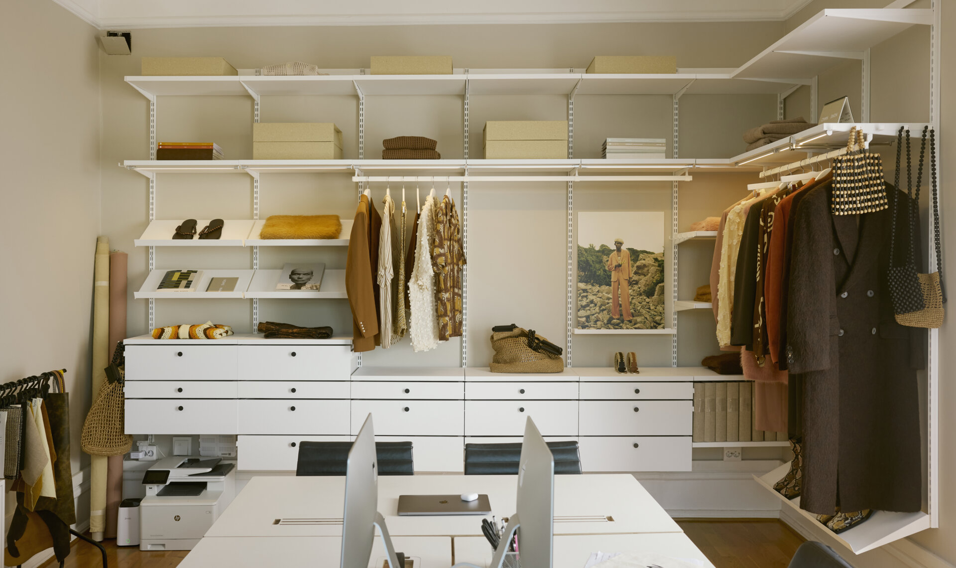 Décor+ by Elfa wardrobe in white in the office of CMMN SWDN.
