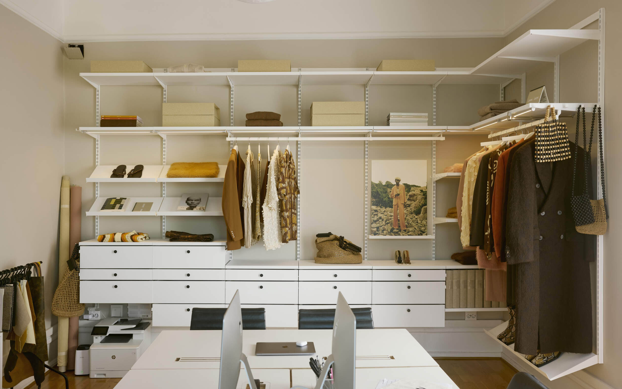 Décor+ by Elfa wardrobe in white in the office of CMMN SWDN.