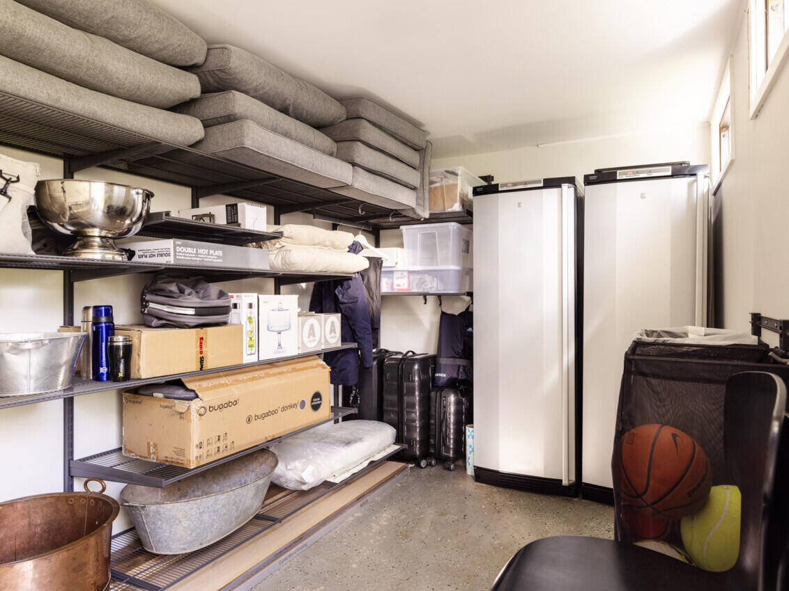 Garage with Garage+ storage from Elfa used for storing toys and children’s bicycles.