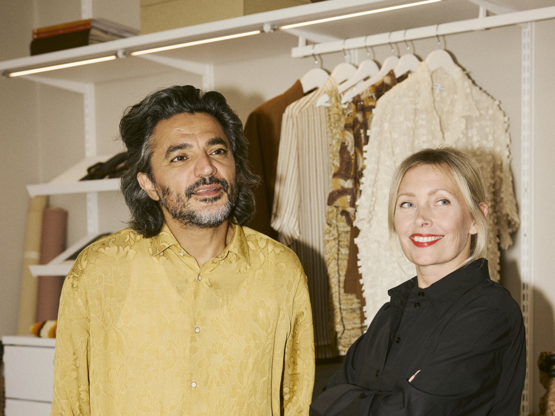 Emma and Saif at a Décor+ by Elfa wardrobe in white.