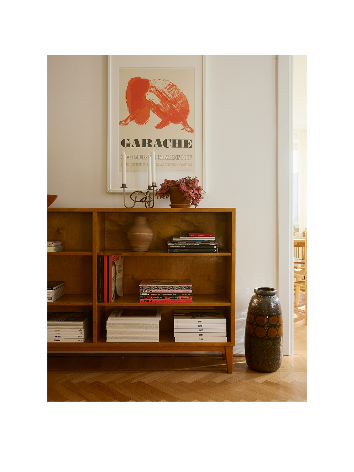 Bookshelf at Emma and Saif’s home with books and ornaments.