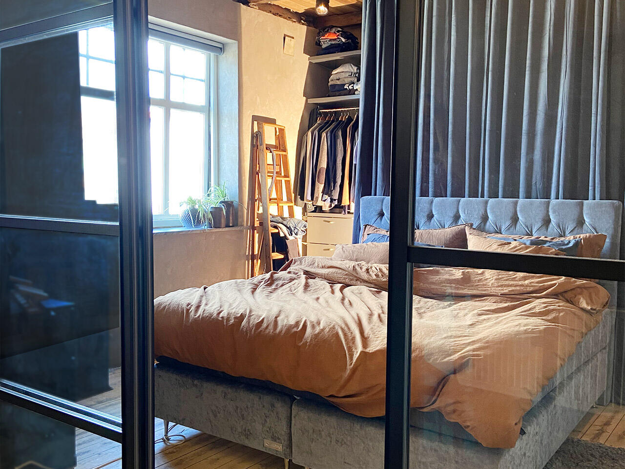 Bedroom with sliding doors as room dividers