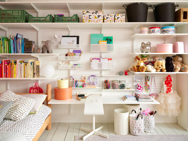 Children's room with desk hung on the wall