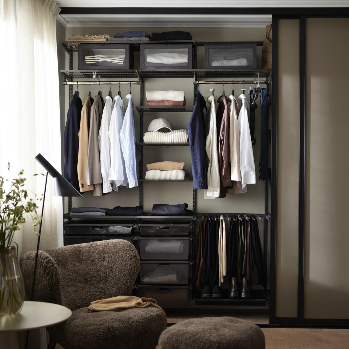 Picture from a men's wardrobe with shirts and trousers