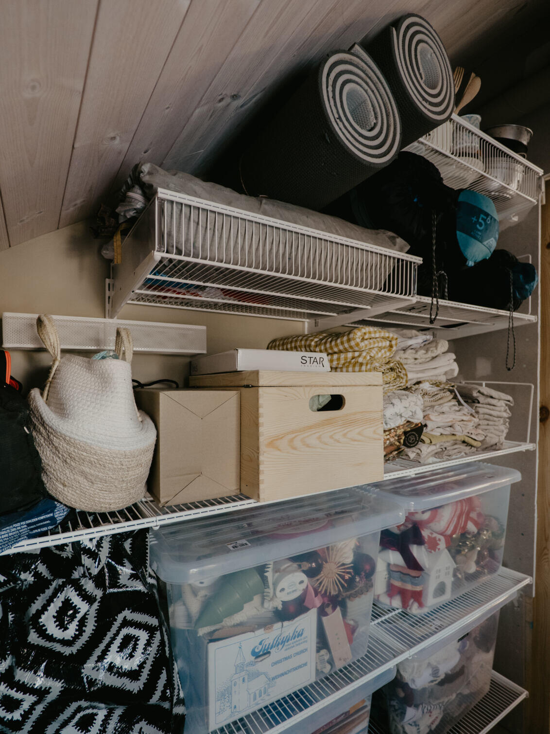 use both wire shelves and wire baskets to keep things tidy.