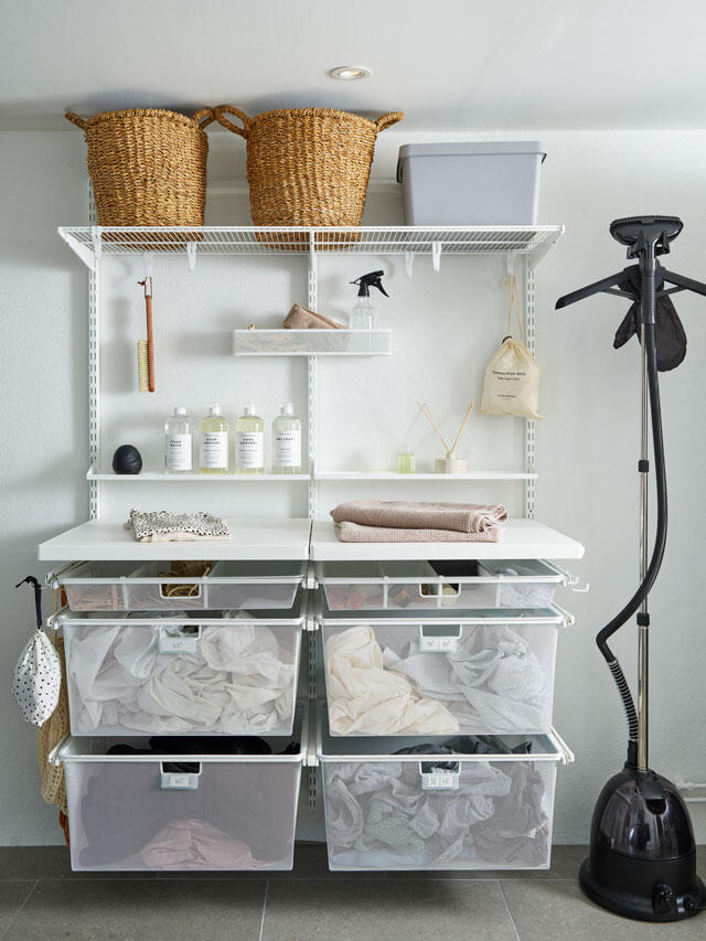 Laundry room with washing and folding station