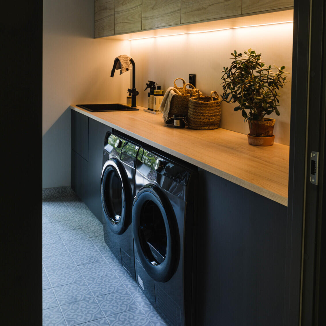 Fanny and Alex's laundry room awaits for eleven solution