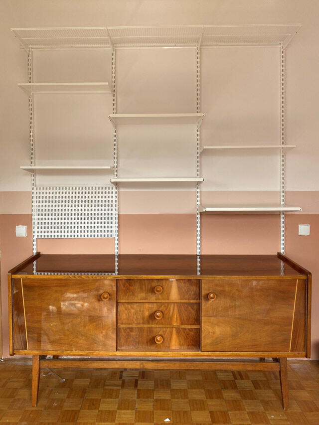 Eleven shelves on top of TV bench