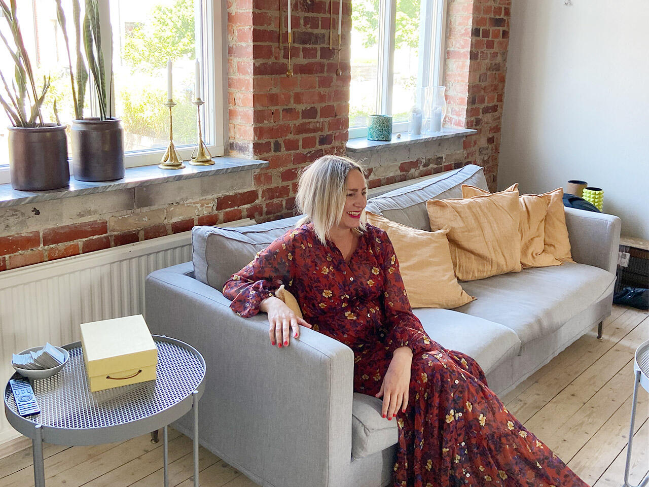 Maria on the sofa in the living room