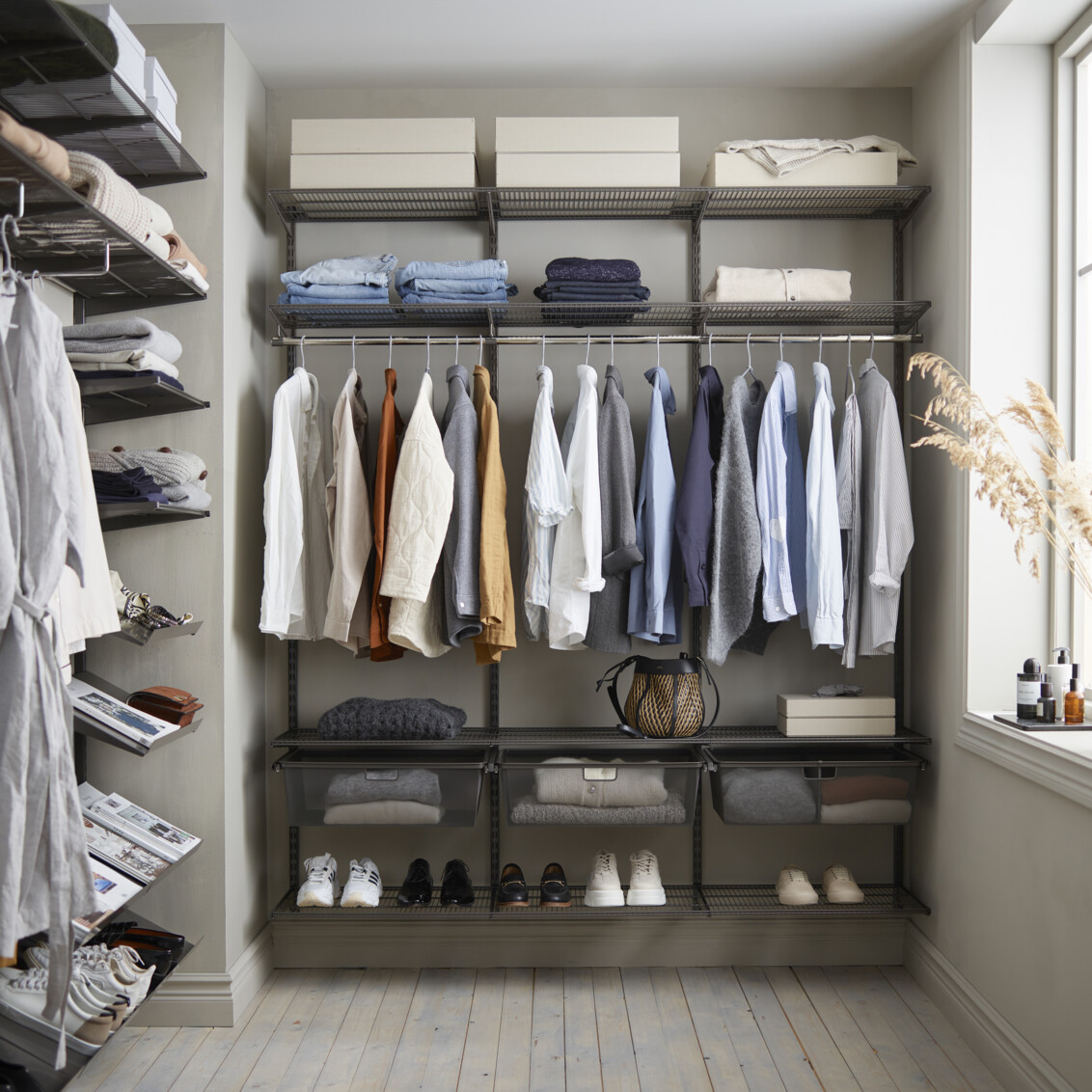 Walk-in closet with storage from Classic by Elfa in grey with outerwear and shoes.