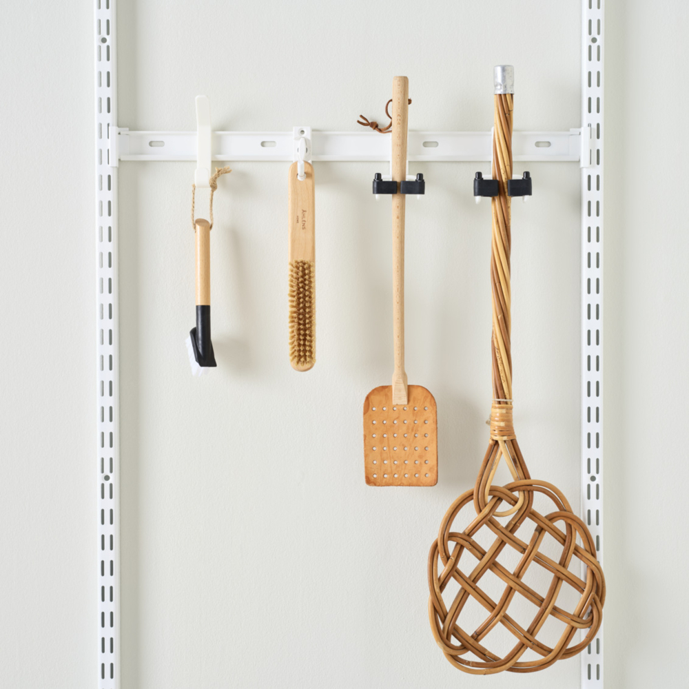 Classic by Elfa storage track for storing clay products.