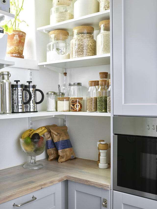 Organised glass jars on Elfa shelving system in kitchens for smart storage