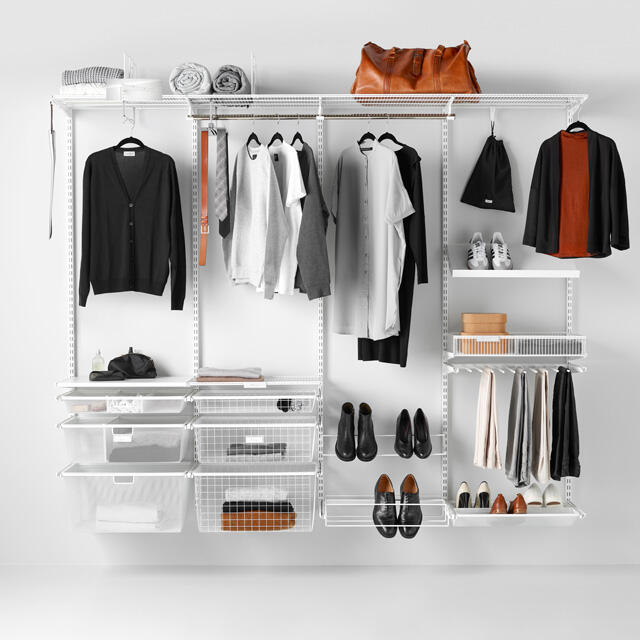 Clothes storage on the wall with wire shelves and wire trays