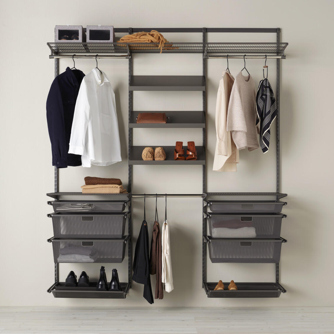 Storage solution for wardrobe with shelves, pull-out drawers in graphite.
