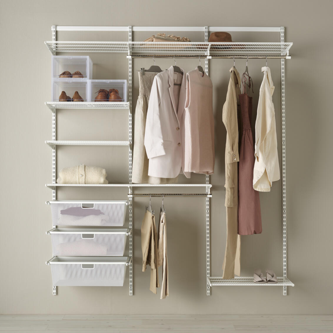 Storage solution for wardrobe with shelves, pull-out drawers in white.