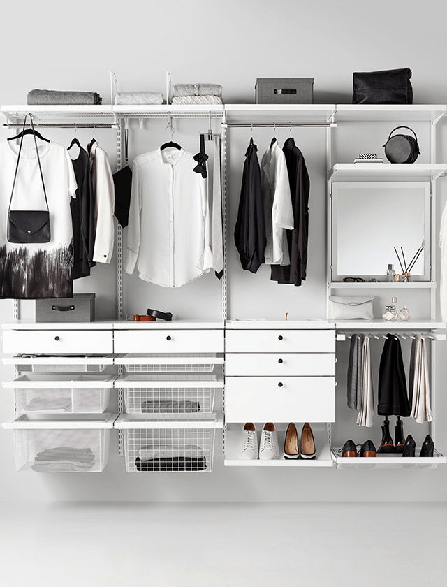 Wall-mounted storage with wire shelves, pull-out trays and drawer front.