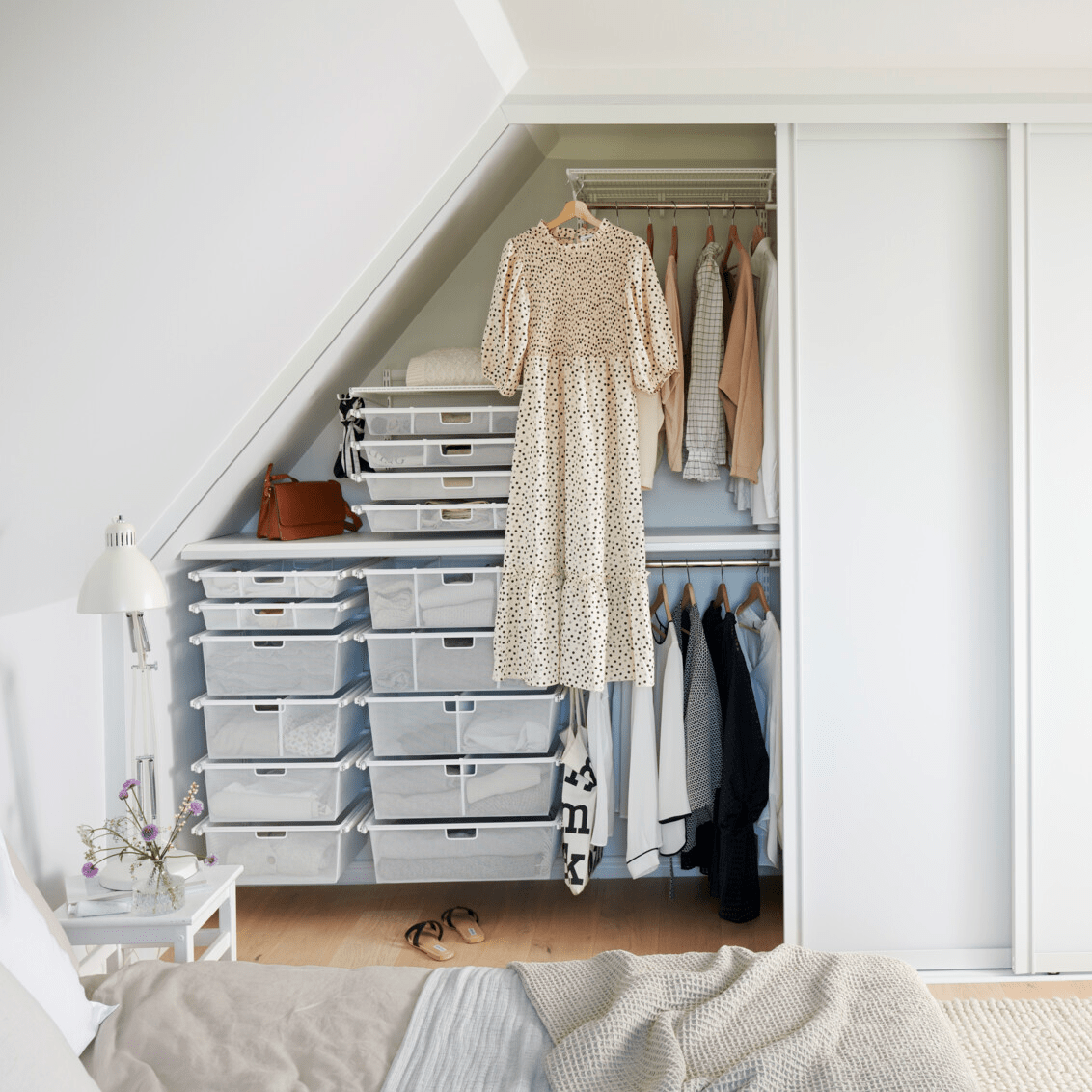 Open wardrobe with clothes storage with sliding doors Estetic with diagonal cutting.